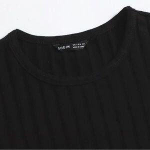 MmrJ NWT Black, ribbed, body con dress with ties on the side for shirring.